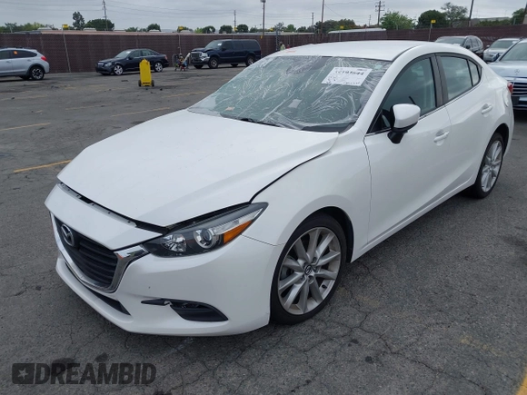 2017 Mazda 3 Touring with VIN 3MZBN1V72HM121902, listed as a IAAI auction lot 39193644 with 40,113 mi miles and . Bid and sale history available at DreamBid. Image 2.