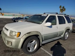 2001 Infiniti QX4 Luxury z VIN JNRDR09Y51W212522, wystawiony jako Copart lot #77044784 z przebiegiem 308 949 mil mil oraz Tytuł czysty. Historia ofert i sprzedaży dostępna na DreamBid. Obrazek 1.