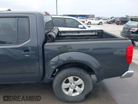 2012 Nissan Frontier SV z VIN 1N6AD0ER4CC402085, wystawiony jako IAAI lot #41975832 z przebiegiem 263 152 mil mil oraz . Historia ofert i sprzedaży dostępna na DreamBid. Obrazek 6.