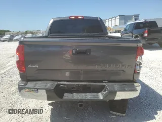 2014 Toyota Tundra SR5 z VIN 5TFDW5F19EX376160, wystawiony jako Copart lot #55012555 z przebiegiem 166 708 mil mil oraz Nie do naprawy • Non repairable. Historia ofert i sprzedaży dostępna na DreamBid. Obrazek 6.