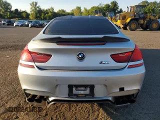 2013 BMW M6 z VIN WBSLX9C58DD159800, wystawiony jako Copart lot #68904984 z przebiegiem 107 426 mil mil oraz Szkoda całkowita • Salvage title. Historia ofert i sprzedaży dostępna na DreamBid. Obrazek 6.