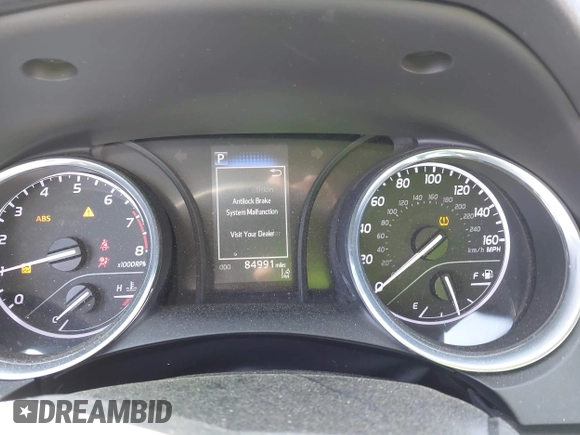 2020 Toyota Camry LE with VIN 4T1C11AK9LU341762, listed as a IAAI auction lot 42001577 with 84,991 mi miles and . Bid and sale history available at DreamBid. Image 7.