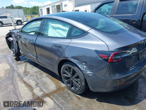 2023 Tesla Model 3 z VIN 5YJ3E1EA7PF413311, wystawiony jako IAAI lot #42442055 z przebiegiem 25 270 mil mil oraz . Historia ofert i sprzedaży dostępna na DreamBid. Obrazek 3.