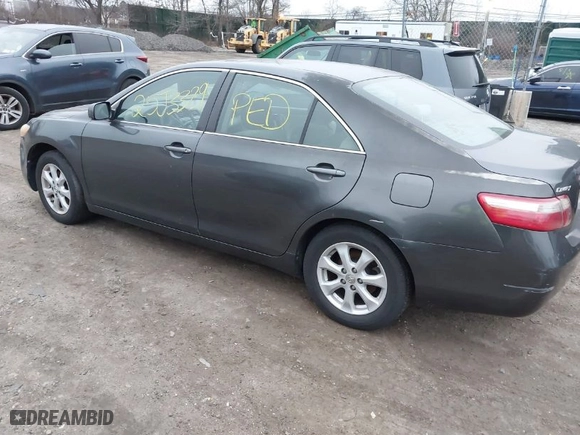 2007 Toyota Camry CE with VIN 4T1BE46K37U669145, listed as a IAAI auction lot 41927728 with 999,999 mi miles. Bid and sale history available at carsss.com. Image 3.