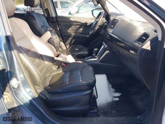 2015 Mazda CX-5 Grand Touring with VIN JM3KE4DY1F0541592, listed as a IAAI auction lot 41585018 with 113,016 mi miles. Bid and sale history available at carsss.com. Image 5.