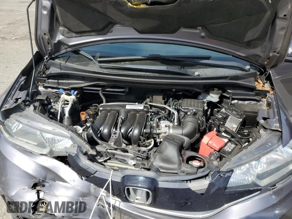 2015 Honda Fit EX-L with VIN 3HGGK5H80FM767970, listed as a Copart auction lot 55866075 with 64,435 mi miles and Salvage Title. Bid and sale history available at DreamBid. Image 12.