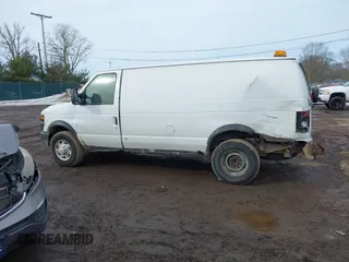2009 Ford Econoline Cargo z VIN 1FTNE24L99DA19725, wystawiony jako IAAI lot #41652405 z przebiegiem Nie podano mil oraz . Historia ofert i sprzedaży dostępna na DreamBid. Obrazek 15.