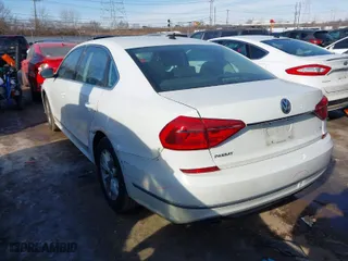 2016 Volkswagen Passat 1.8T S with VIN 1VWAS7A35GC015437, listed as a IAAI auction lot 41403316 with 167,873 mi miles. Bid and sale history available at carsss.com. Image 3.