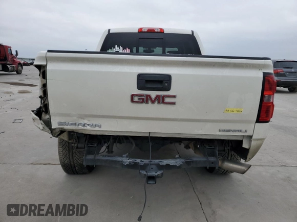 2014 GMC Sierra 1500 Denali z VIN 3GTP1WEC3EG323320, wystawiony jako Copart lot #81966444 z przebiegiem Nie podano mil oraz Szkoda całkowita • Salvage title. Historia ofert i sprzedaży dostępna na DreamBid. Obrazek 6.