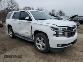 2017 Chevrolet Tahoe LT with VIN 1GNSKBKC7HR161997, listed as a Copart auction lot 44857395 with 142,345 mi miles and Salvage Title. Bid and sale history available at DreamBid. Image 4.