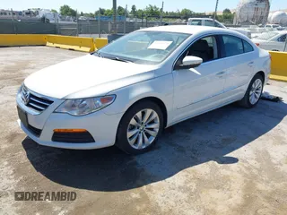 2012 Volkswagen CC Sport with VIN WVWNP7AN0CE532764, listed as a IAAI auction lot 42504373 with 97,562 mi miles and . Bid and sale history available at DreamBid. Image 2.