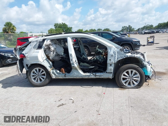 2022 Toyota Corolla Cross LE with VIN 7MUBAAAG9NV012455, listed as a IAAI auction lot 42671891 with Not provided miles and . Bid and sale history available at DreamBid. Image 13.