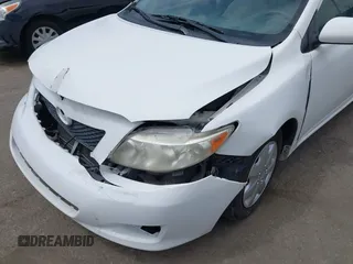 2010 Toyota Corolla with VIN JTDBU4EE6AJ063009, listed as a IAAI auction lot 42034688 with 168,643 mi miles. Bid and sale history available at carsss.com. Image 6.