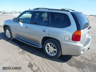 2006 GMC Envoy Denali with VIN 1GKET63M762312848, listed as a IAAI auction lot 41764304 with 115,854 mi miles. Bid and sale history available at carsss.com. Image 3.