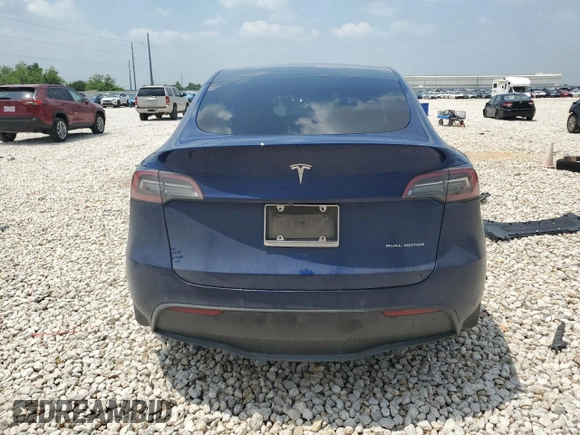 2022 Tesla Model Y Long Range z VIN 7SAYGDEE7NF313228, wystawiony jako Copart lot #55060705 z przebiegiem 32 238 mil mil oraz Szkoda całkowita • Salvage title. Historia ofert i sprzedaży dostępna na DreamBid. Obrazek 6.