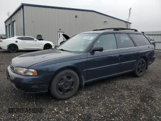 1995 Subaru Legacy LS with VIN 4S3BK6551S7311182, listed as a Copart auction lot 62820985 with 163,540 mi miles and Salvage title. Bid and sale history available at DreamBid. Image 1.