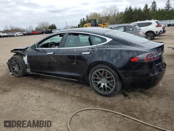 2017 Tesla Model S 100D with VIN 5YJSA1E21HF218273, listed as a Copart auction lot 55598075 with Not provided miles and Salvage title. Bid and sale history available at DreamBid. Image 2.