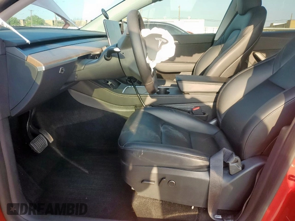 2023 Tesla Model Y Long Range z VIN 7SAYGDEE8PA138780, wystawiony jako Copart lot #53294385 z przebiegiem 137 496 mil mil oraz Szkoda całkowita • Salvage title. Historia ofert i sprzedaży dostępna na DreamBid. Obrazek 7.