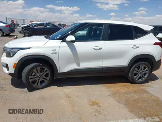 2023 Kia Seltos LX with VIN KNDEPCAA7P7367893, listed as a IAAI auction lot 42184883 with 21,993 mi miles and . Bid and sale history available at DreamBid. Image 14.