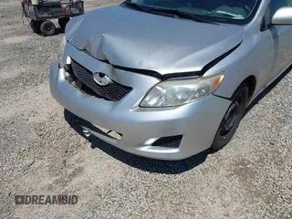 2009 Toyota Corolla with VIN 1NXBU40E39Z138651, listed as a IAAI auction lot 42142888 with 136,343 mi miles and . Bid and sale history available at DreamBid. Image 6.
