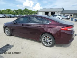 2017 Ford Fusion SE with VIN 3FA6P0H76HR415381, listed as a Copart auction lot 62000325 with 173,319 mi miles and Salvage title. Bid and sale history available at DreamBid. Image 2.