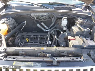 2010 Mercury Mariner with VIN 4M2CN9B75AKJ15058, listed as a IAAI auction lot 42042347 with 220,242 mi miles. Bid and sale history available at carsss.com. Image 10.