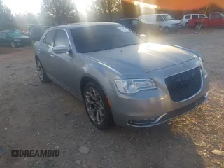 2016 Chrysler 300 with VIN 2C3CCAPG6GH167731, listed as a IAAI auction lot 41779615 with 127,679 mi miles. Bid and sale history available at carsss.com. Image 1.