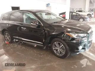 2020 Infiniti QX60 Pure with VIN 5N1DL0MN3LC533814, listed as a IAAI auction lot 41077349 with 79,377 mi miles and . Bid and sale history available at DreamBid. Image 1.