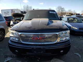 2005 GMC Sierra Denali z VIN 2GTEK63N551188181, wystawiony jako Copart lot #43548845 z przebiegiem 2 417 198 mil mil oraz Szkody całkowita. Historia ofert i sprzedaży dostępna na DreamBid. Obrazek 5.