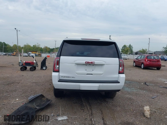 2019 GMC Yukon XL SLT with VIN 1GKS2GKC2KR369285, listed as a IAAI auction lot 40279008 with Not Provided miles and . Bid and sale history available at DreamBid. Image 16.