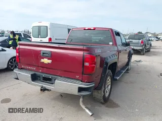 2015 Chevrolet Silverado 1500 LT with VIN 3GCUKREC0FG261927, listed as a IAAI auction lot 41598096 with Not Provided miles and . Bid and sale history available at DreamBid. Image 4.