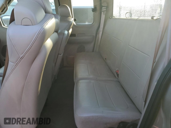 2001 Ford F-150 XL with VIN 1FTRX17L41NA96180, listed as a Copart auction lot 87309224 with 95,505 mi miles and Salvage title. Bid and sale history available at DreamBid. Image 10.