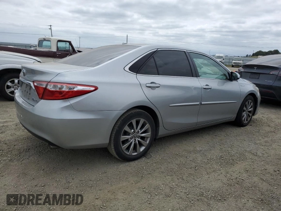 2015 Toyota Camry LE with VIN 4T1BD1FKXFU151730, listed as a Copart auction lot 54393225 with 219,892 mi miles and Salvage title. Bid and sale history available at DreamBid. Image 3.