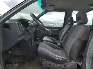 1993 Nissan Frontier SE z VIN 1N6HD16Y0PC408188, wystawiony jako Copart lot #71028394 z przebiegiem 258 939 mil mil oraz Szkoda całkowita • Salvage title. Historia ofert i sprzedaży dostępna na DreamBid. Obrazek 7.