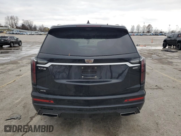 2020 Cadillac XT6 AWD Sport z VIN 1GYKPHRS2LZ129617, wystawiony jako Copart lot #87193304 z przebiegiem Nie podano mil oraz Szkoda całkowita • Salvage title. Historia ofert i sprzedaży dostępna na DreamBid. Obrazek 6.