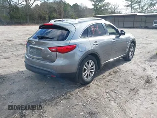 2015 Infiniti QX70 with VIN JN8CS1MWXFM480906, listed as a IAAI auction lot 41177811 with 176,527 mi miles and . Bid and sale history available at DreamBid. Image 4.