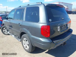 2005 Honda Pilot EX-L with NAVI with VIN 2HKYF18705H559938, listed as a IAAI auction lot 41814487 with 188,665 mi miles. Bid and sale history available at carsss.com. Image 6.