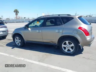 2004 Nissan Murano SL z VIN JN8AZ08T94W204232, wystawiony jako IAAI lot #42239543 z przebiegiem Nie podano mil oraz . Historia ofert i sprzedaży dostępna na DreamBid. Obrazek 13.