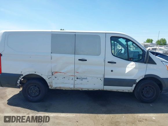 2016 Ford Transit Cargo with VIN 1FTYR1ZM3GKA69459, listed as a IAAI auction lot 42267325 with 183,940 mi miles and . Bid and sale history available at DreamBid. Image 6.
