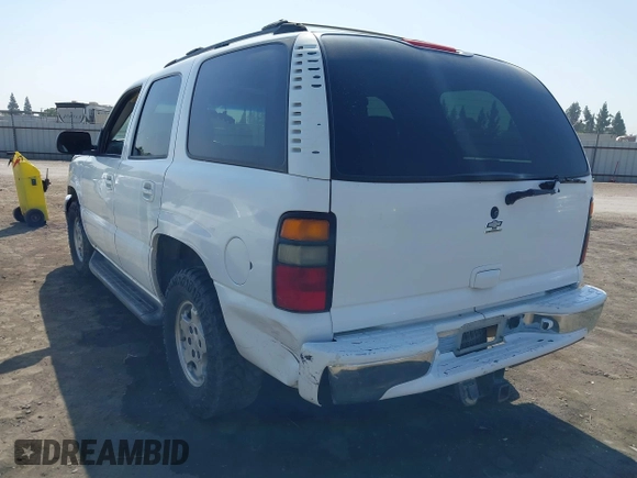 2004 Chevrolet Tahoe LS with VIN 1GNEC13T44R321833, listed as a IAAI auction lot 40559396 with 170,652 mi miles and . Bid and sale history available at DreamBid. Image 3.
