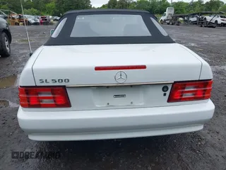 1991 Mercedes-Benz 500 z VIN WDBFA66E9MF020617, wystawiony jako IAAI lot #42355637 z przebiegiem 93 104 mil mil oraz . Historia ofert i sprzedaży dostępna na DreamBid. Obrazek 16.