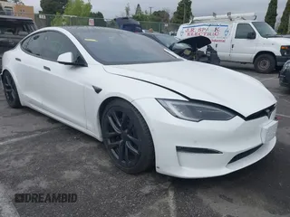 2022 Tesla Model S Plaid with VIN 5YJSA1E65NF488864, listed as a IAAI auction lot 41772788 with 33,915 mi miles and . Bid and sale history available at carsss.com. Image 1.