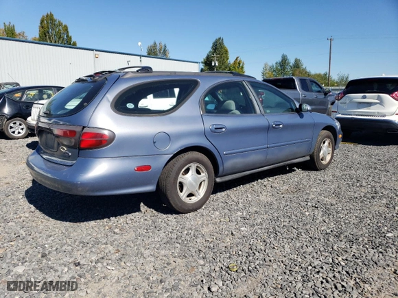 1999 Ford Taurus SE Standard with VIN 1FAFP58U9XG271897, listed as a Copart auction lot 73048784 with 190,518 mi miles and Salvage Title. Bid and sale history available at carsss.com. Image 3.