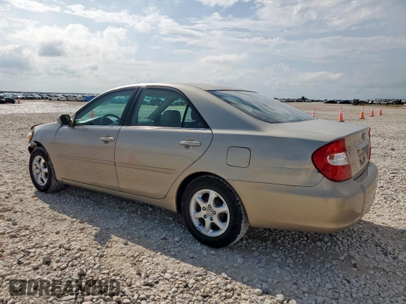2004 Toyota Camry LE with VIN 4T1BE32K14U329066, listed as a Copart auction lot 60711515 with 178,144 mi miles and Salvage title. Bid and sale history available at DreamBid. Image 2.