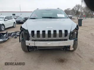 2014 Jeep Cherokee Latitude with VIN 1C4PJMCS7EW220899, listed as a IAAI auction lot 41973561 with 135,572 mi miles. Bid and sale history available at carsss.com. Image 6.
