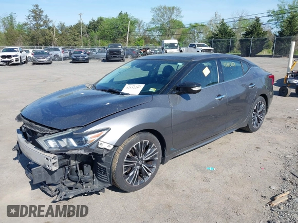 2017 Nissan Maxima SR with VIN 1N4AA6AP1HC387058, listed as a IAAI auction lot 42112287 with 128,460 mi miles and . Bid and sale history available at DreamBid. Image 2.