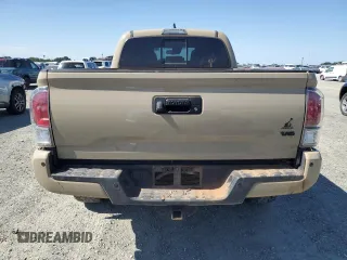 2020 Toyota Tacoma SR5 with VIN 3TMDZ5BN3LM087312, listed as a Copart auction lot 57876405 with 49,201 mi miles and Salvage title. Bid and sale history available at DreamBid. Image 6.