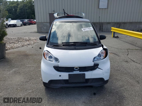 2015 Smart fortwo Passion z VIN WMEEJ3BA8FK797266, wystawiony jako Copart lot #64777655 z przebiegiem 20 995 mil mil oraz Szkoda całkowita • Salvage title. Historia ofert i sprzedaży dostępna na DreamBid. Obrazek 5.