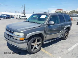 2001 Chevrolet Tahoe LT with VIN 1GNEC13T91R113281, listed as a IAAI auction lot 42081879 with 227,760 mi miles. Bid and sale history available at carsss.com. Image 2.