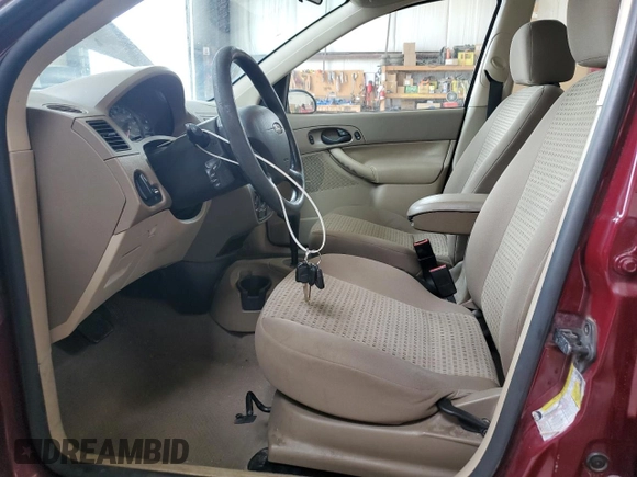 2007 Ford Focus S z VIN 1FAFP34N77W249390, wystawiony jako Copart lot #61817215 z przebiegiem 112 295 mil mil oraz Szkoda całkowita • Salvage title. Historia ofert i sprzedaży dostępna na DreamBid. Obrazek 7.